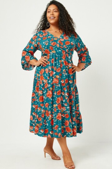 Teal farget midi plus size kjole.